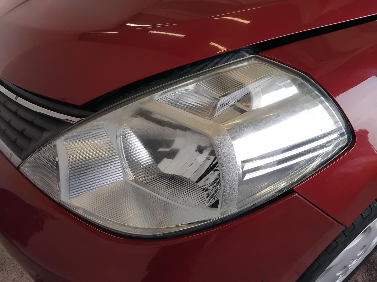 Nissan Tiida C11 original Scheinwerfer links Halogen mit LWR BJ2009 tr&uuml;b