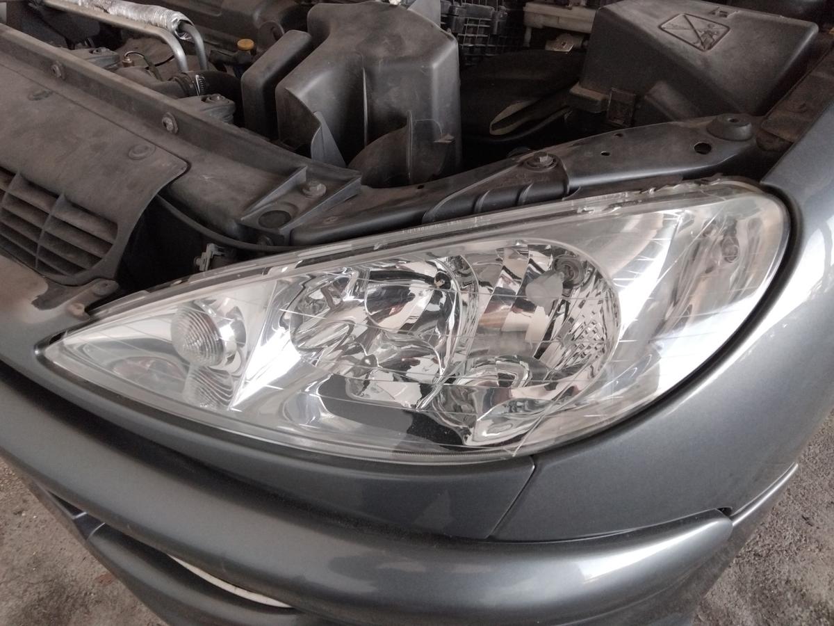 Peugeot 206 original Scheinwerfer vorn links Facelift Halogen mit LWR BJ2008