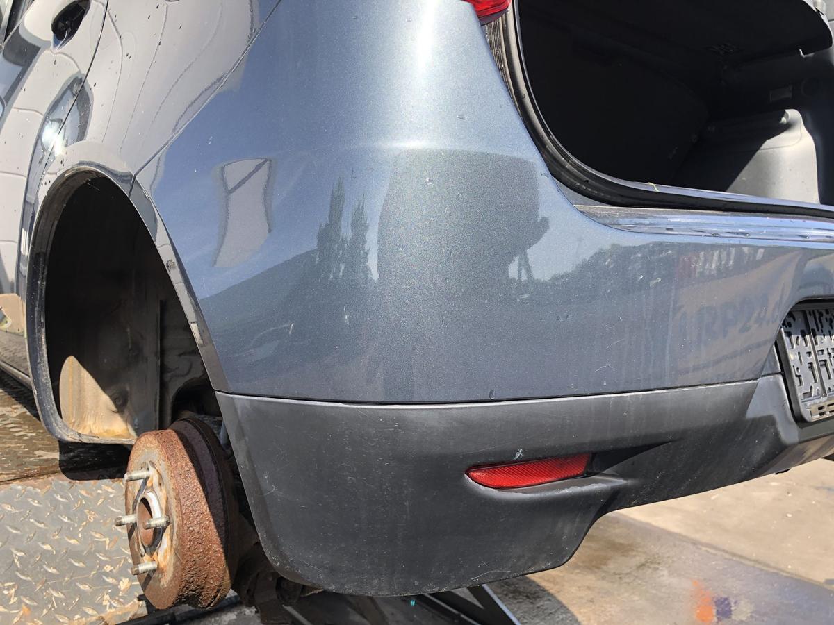 Mitsubishi Colt Z30 original Stoßstange Fänger hinten/Heck U05 Quarzgrau Bj 2009