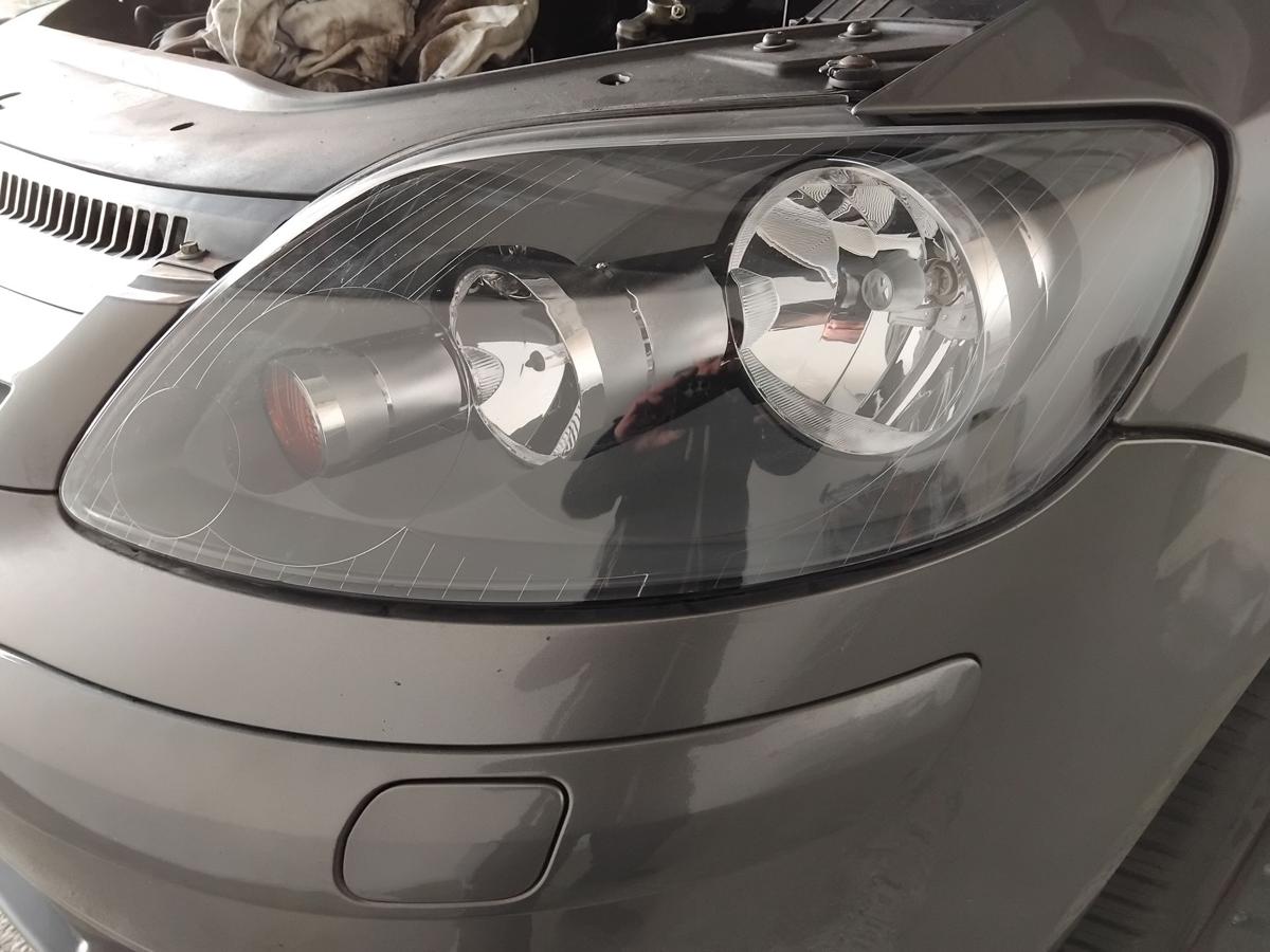 VW Golf Plus 5M Scheinwerfer links TYC Halogen mit LWR BJ2006