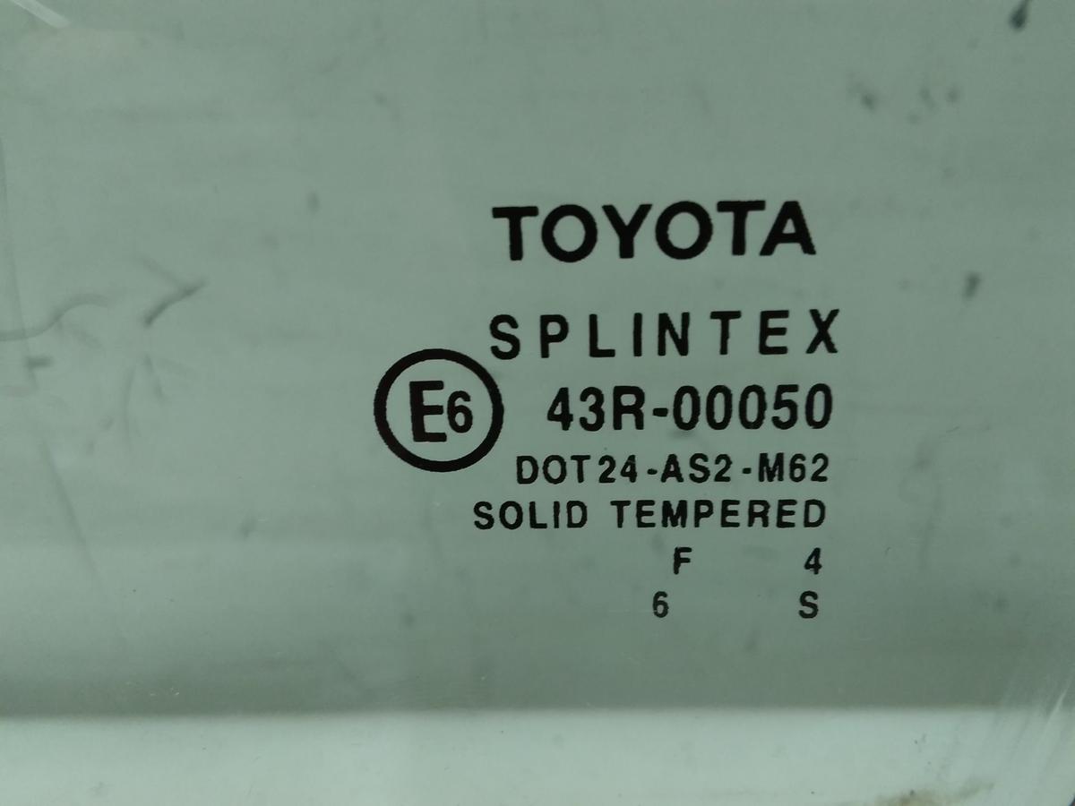 Toyota Avensis T25 original T&uuml;rscheibe vorn links gr&uuml;ncolor BJ2004
