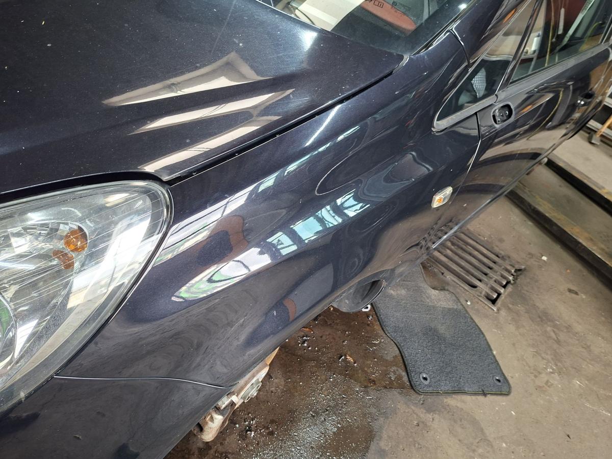 Opel Corsa D orig Kotflügel links Fahrerseite 2HU Saphirschwarz Metallic Bj 2007