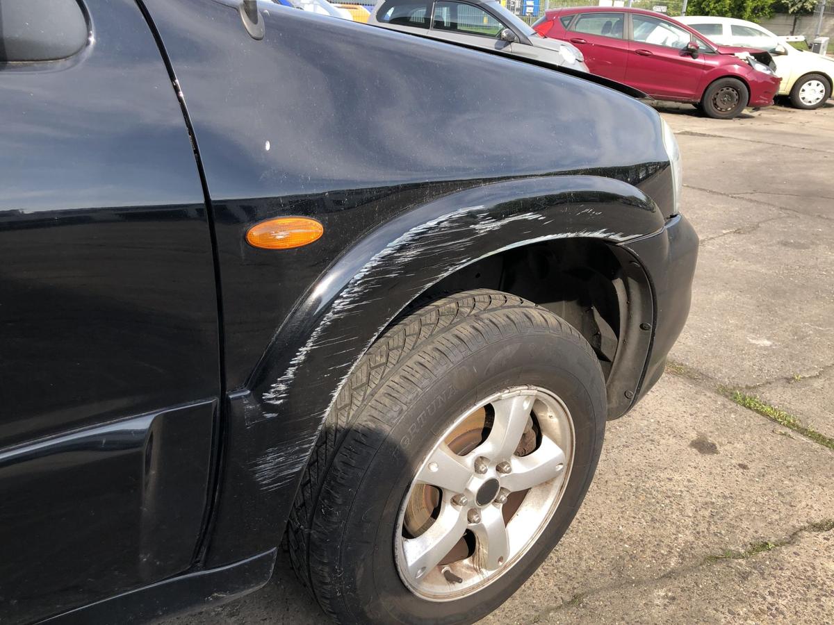 Mazda Tribute EP ab04 Kotflügel vorn rechts Beifahrer Radlauf starke Kratzer