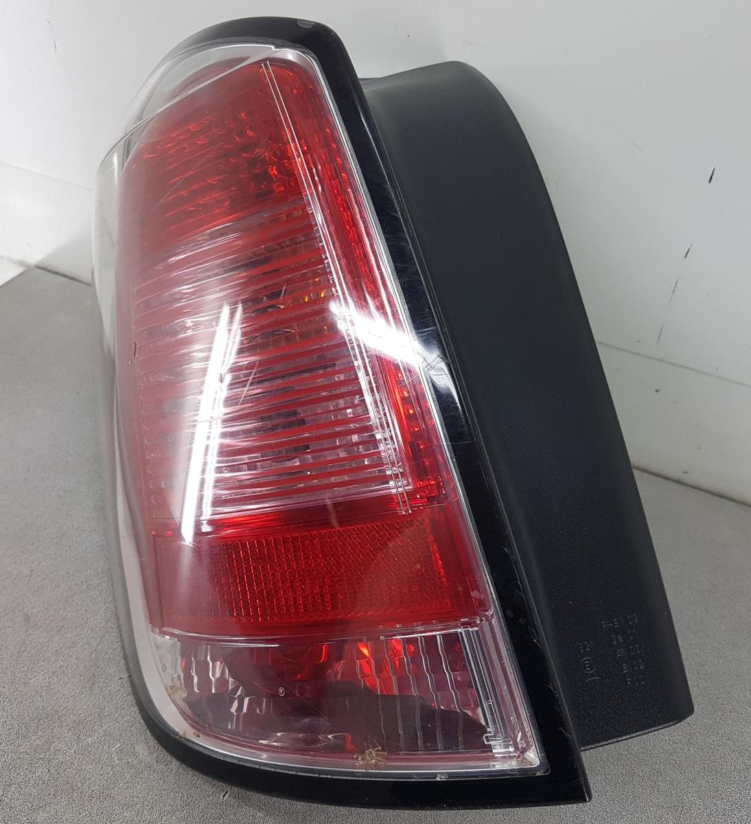 Opel Astra H Caravan Rückleuchte Rücklicht links 24451838 Bj2006 Kombi