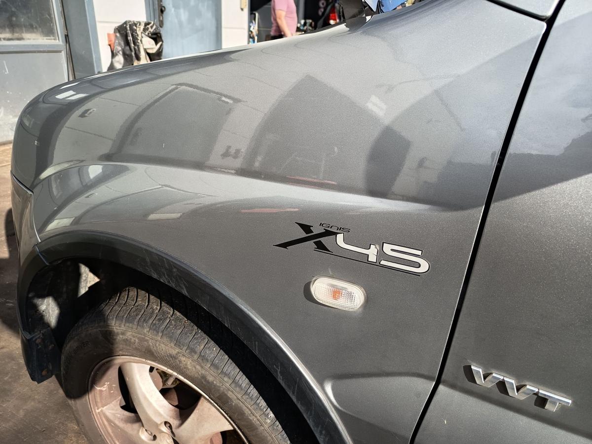 Suzuki Ignis MH original Kotfl&uuml;gel links C12 Midnight Grey Bj 2006