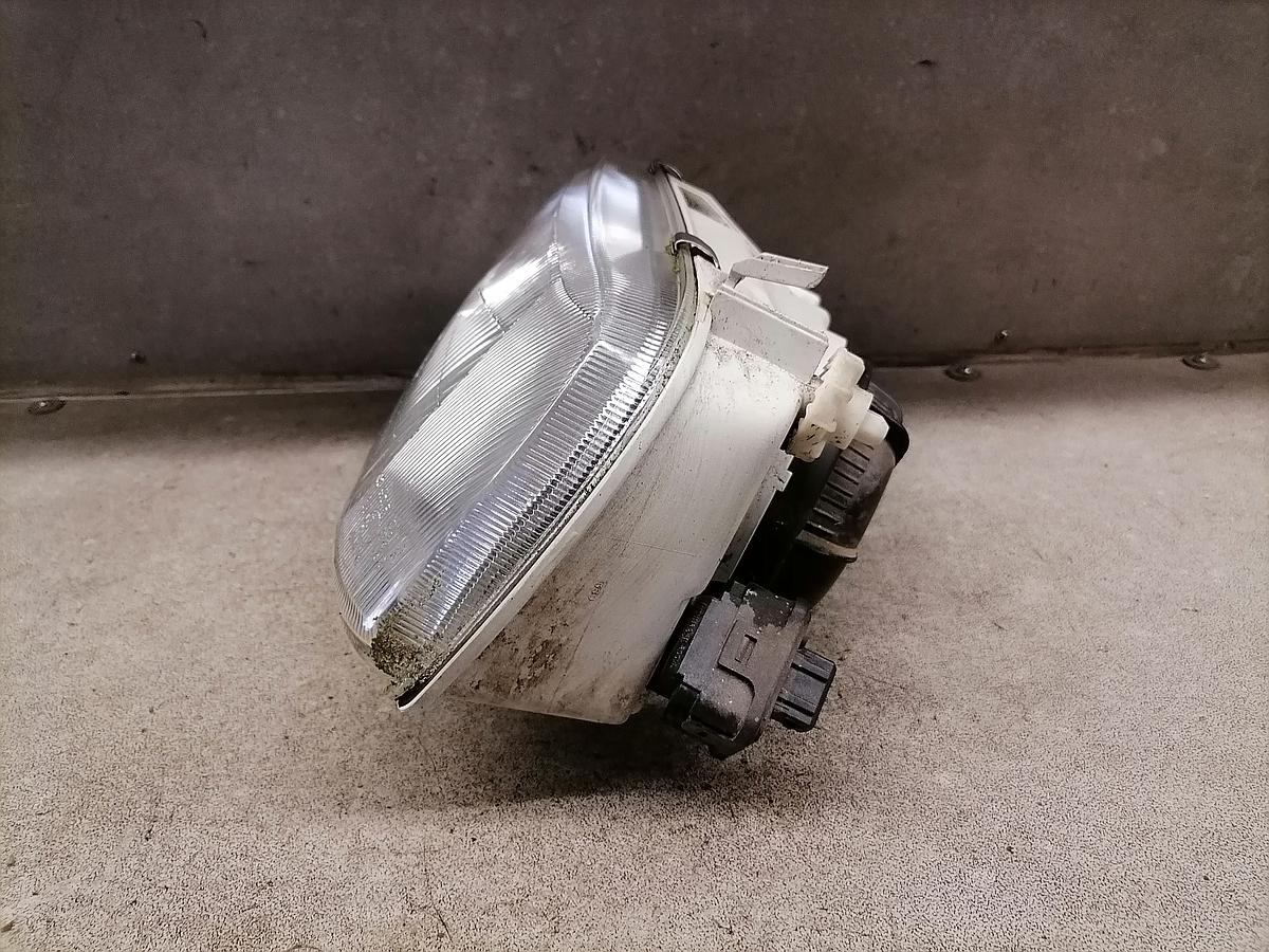 VW Vento Scheinwerfer links vorn Halogen Lampe Hella BJ93-95