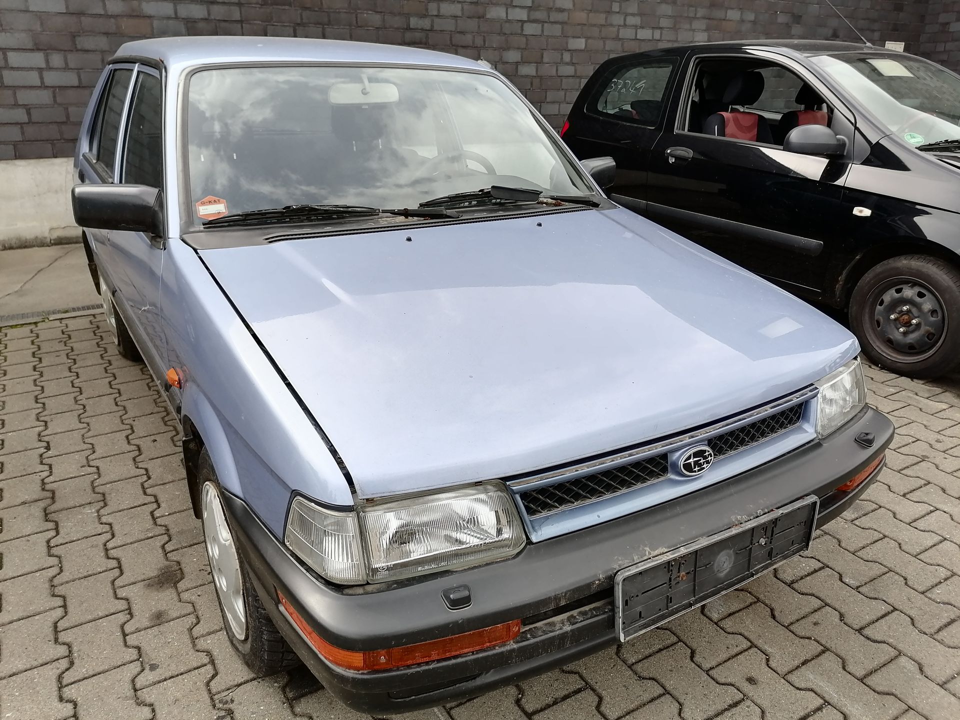 Subaru Justy 1 Stoßstange Stoßfänger vorn BJ89-95