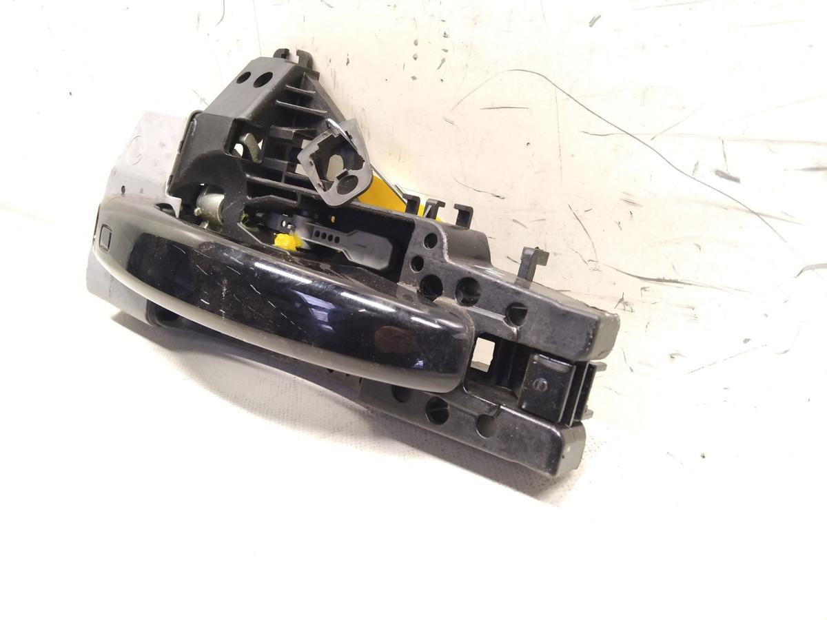 Audi A1 8X orig.T&uuml;rau&szlig;engriff vorn links brillantschwarz LY9B mit Tr&auml;ger BJ2010