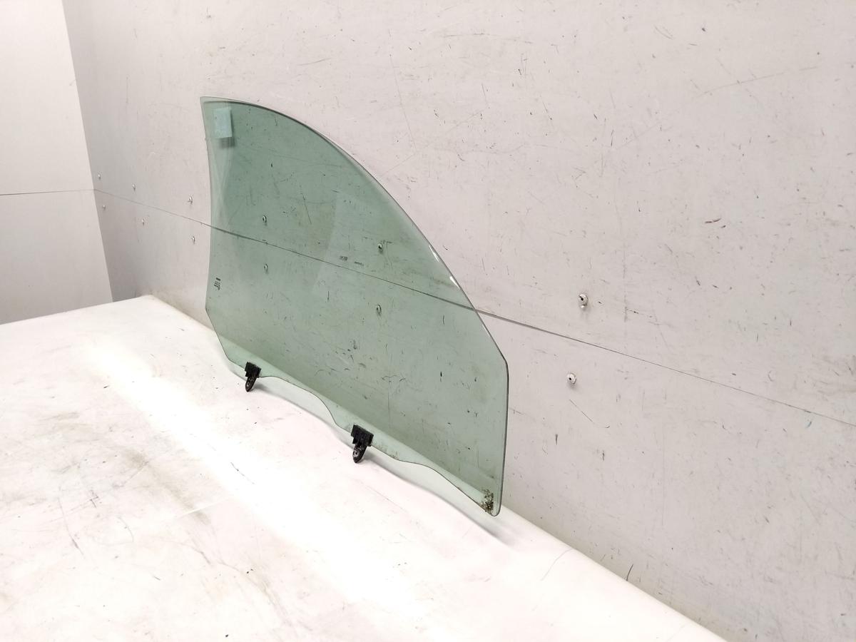 Nissan Primera P12 original T&uuml;rscheibe vorn links gr&uuml;ncolor BJ2002