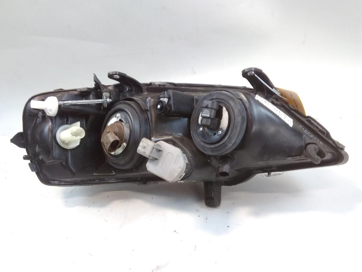 Opel Astra G Scheinwerfer links Halogen mit LWR TYC BJ1998