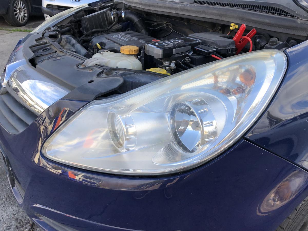 Opel Corsa D Scheinwerfer links Frontscheinwerfer Halogen OEM Trüb bis 2010
