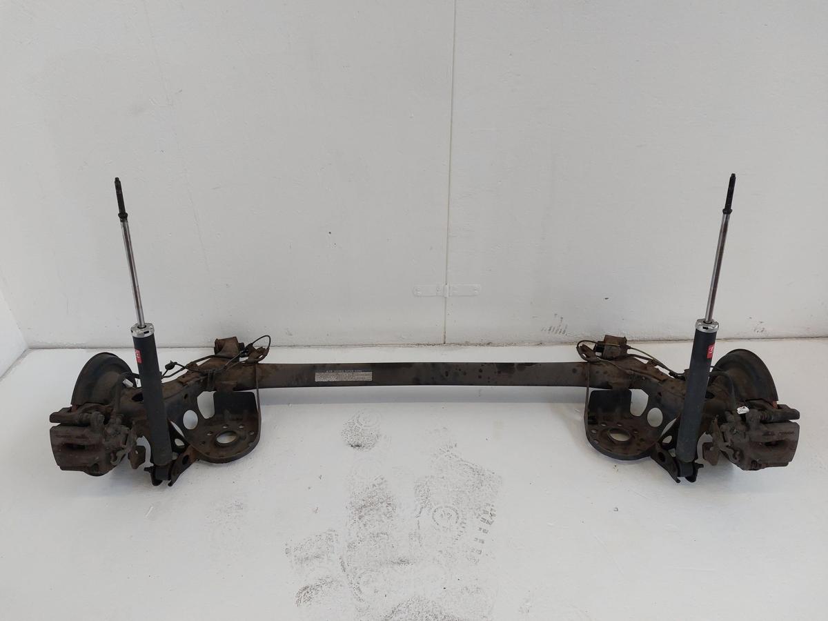 Toyota IQ Typ AJ Hinterachse Achse hinten Achsk&ouml;rper mit Schiebenbremse