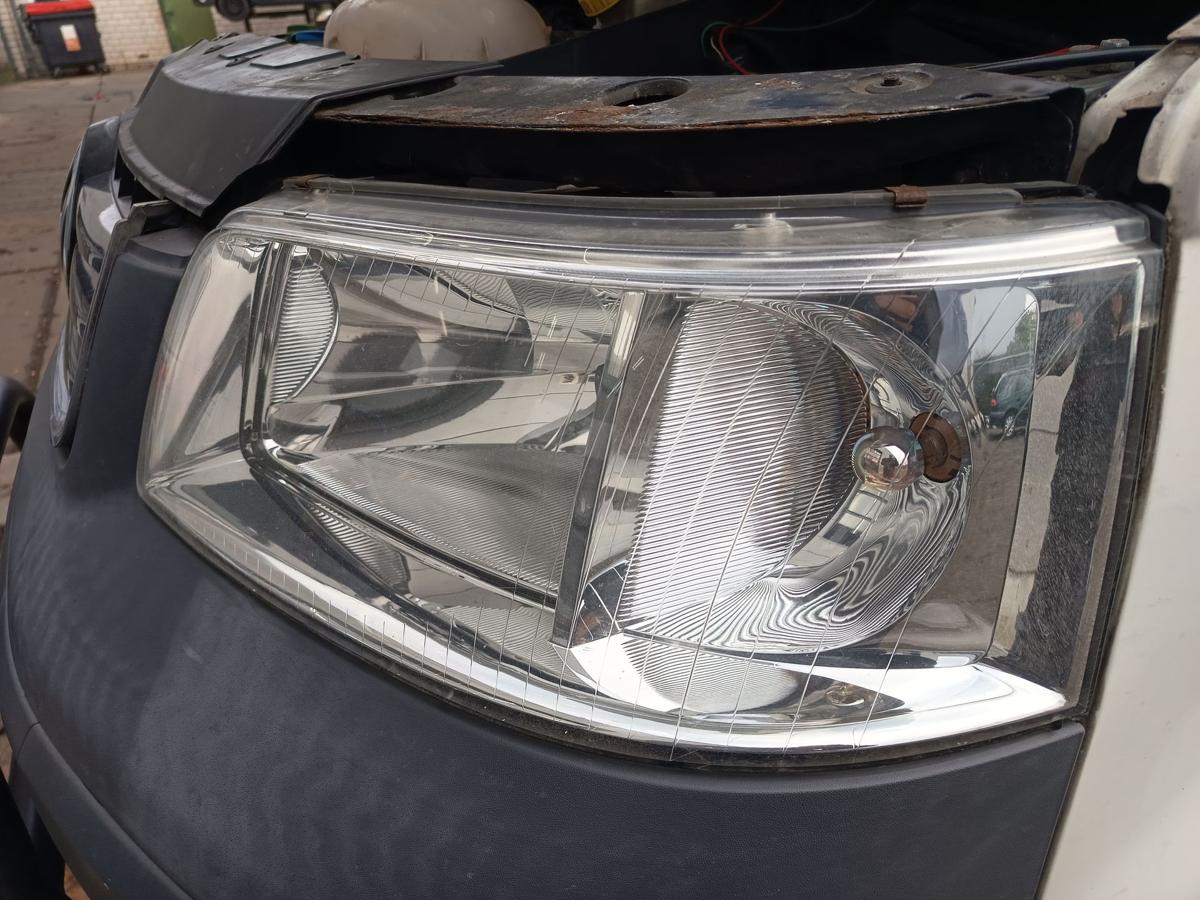 VW T5 7H Transporter orig Hauptscheinwerfer links H4 Halogen Front Licht Bj 2006