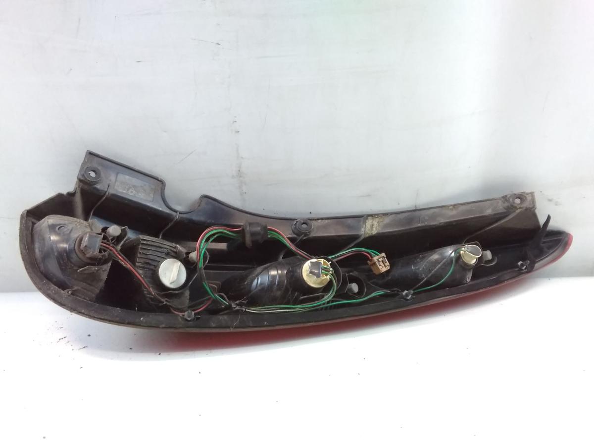 Nissan Almera Tino original Rückleuchte Schlussleuchte links BJ2001