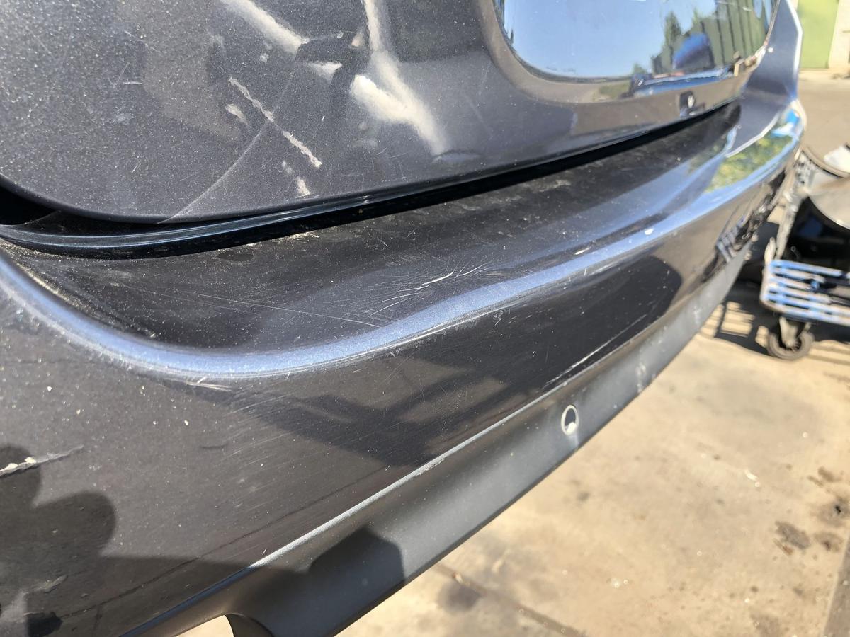 Renault Laguna III orig Stoßstange Fänger hinten/Heck B66 Graphitschwarz Bj 2010