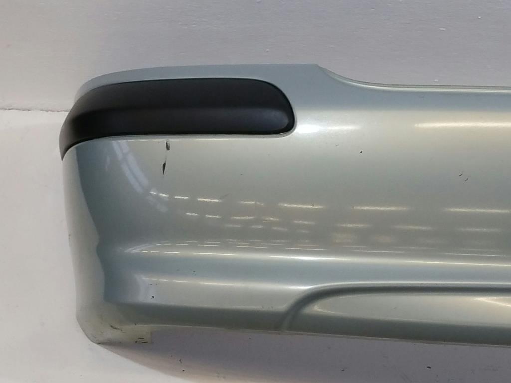 Stoßfänger Stoßstange hinten DX1 Century Green Nissan Almera N16 Originalteil