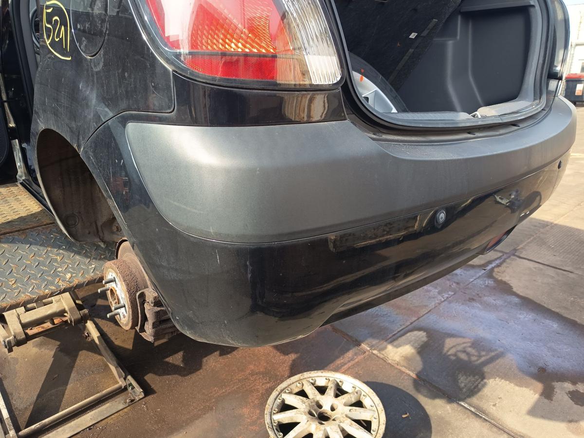Kia Rio II 5t&uuml;rer original Sto&szlig;stange F&auml;nger hinten Heck Midnight Black Bj 2009