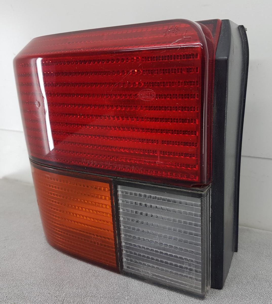 VW T4 R&uuml;ckleuchte R&uuml;cklicht links 9EL146371001 Bj1995