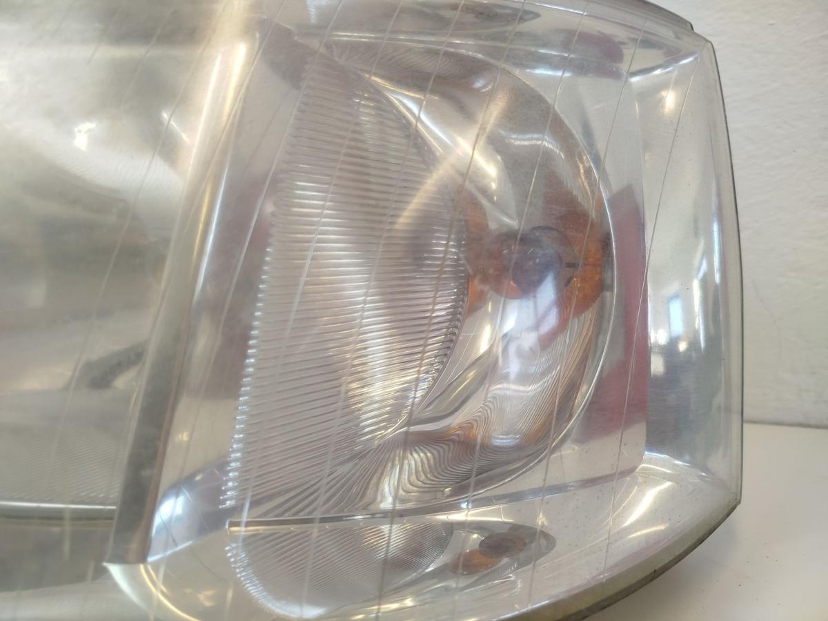 VW T5 7H Scheinwerfer vorn links Frontscheinwerfer Haligen H4 Tr&uuml;b OEM