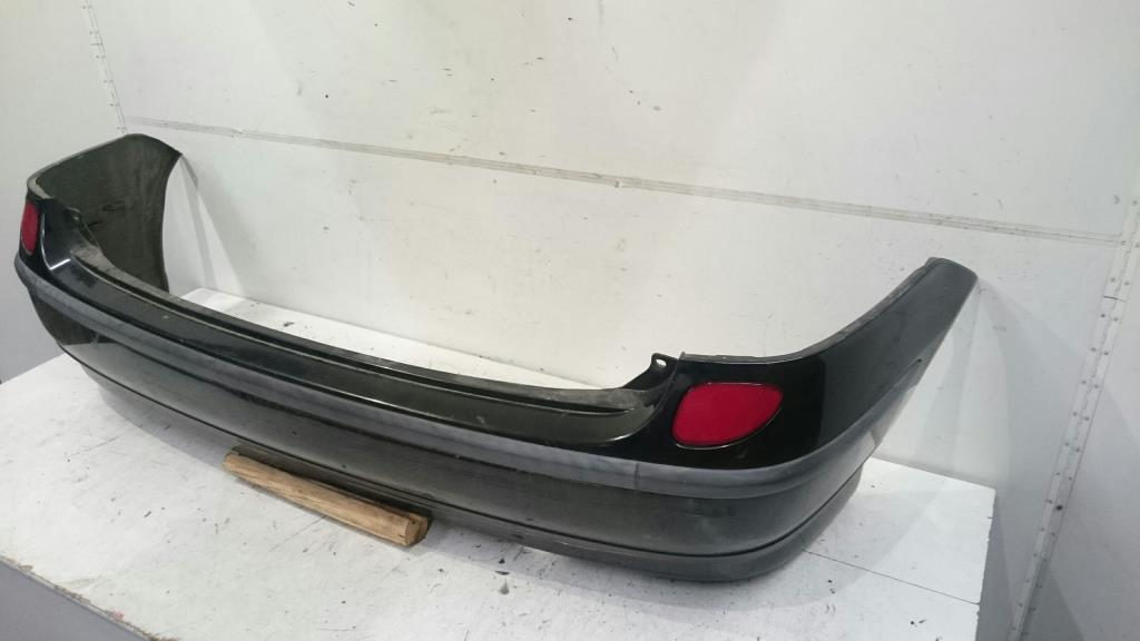 Nissan Almera Tino BJ 2003 Stoßstange hinten Stoßfänger Schwarz 03-06