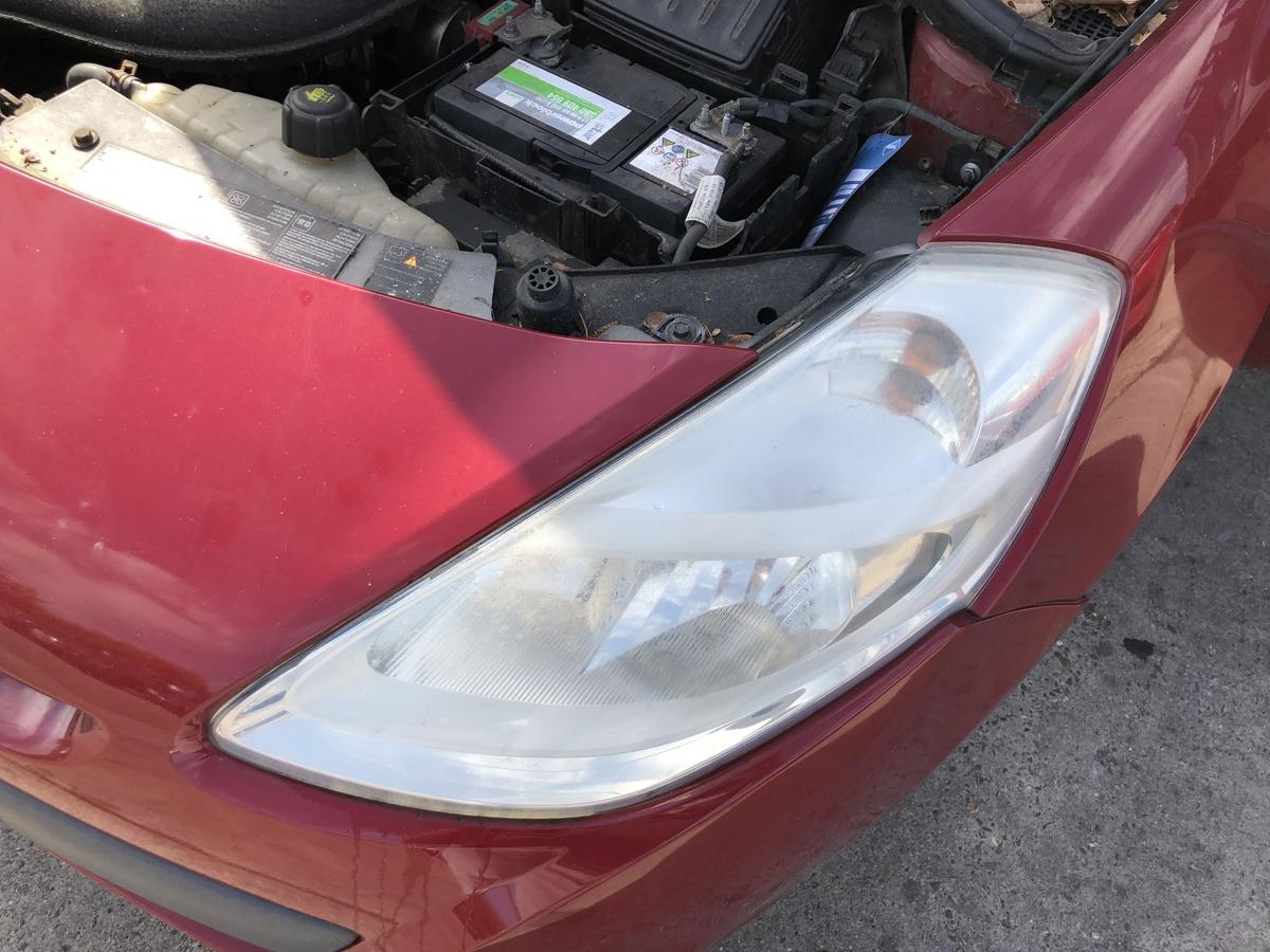 Renault Clio 3 III Grandtour Scheinwerfer links Frontscheinwerfer Halogen ab09