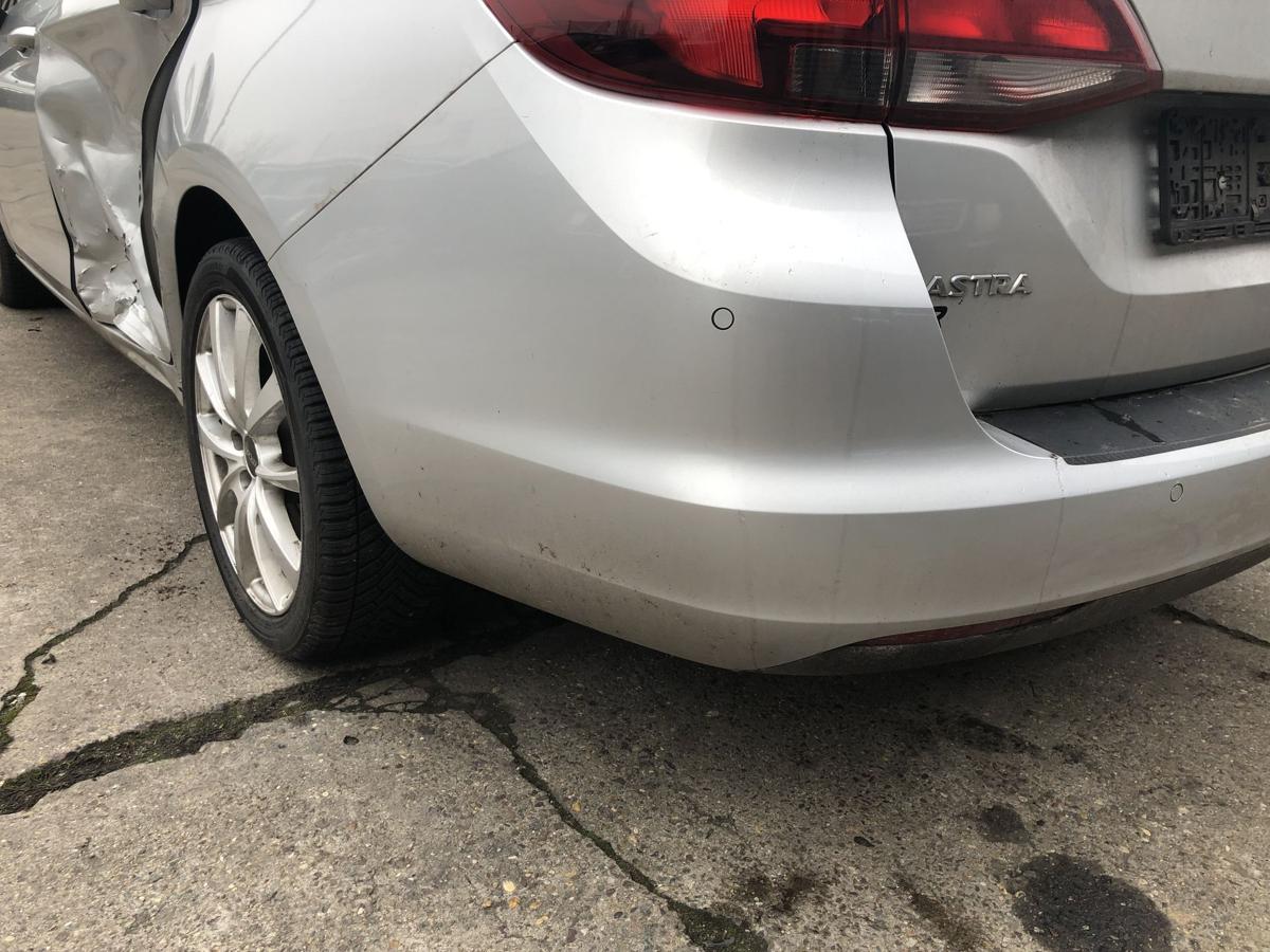 Opel Astra K B16 Caravan Stoßfänger hinten Heckschürze mit PDC Z176 Argonsilber