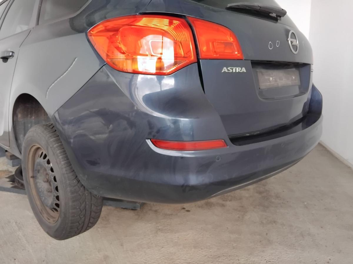 Opel Astra J Sports Tourer orig.Stoßfänger hinten PDC BJ2011 Z22A ozeanblaumetallic