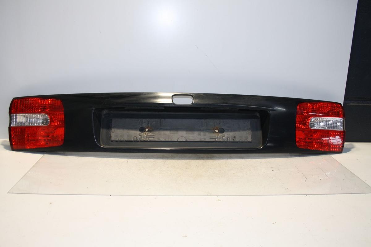 Volvo V40 orig Heckblende Abdeckung Kofferraum Lichtband 347 Titangraumet Bj 03