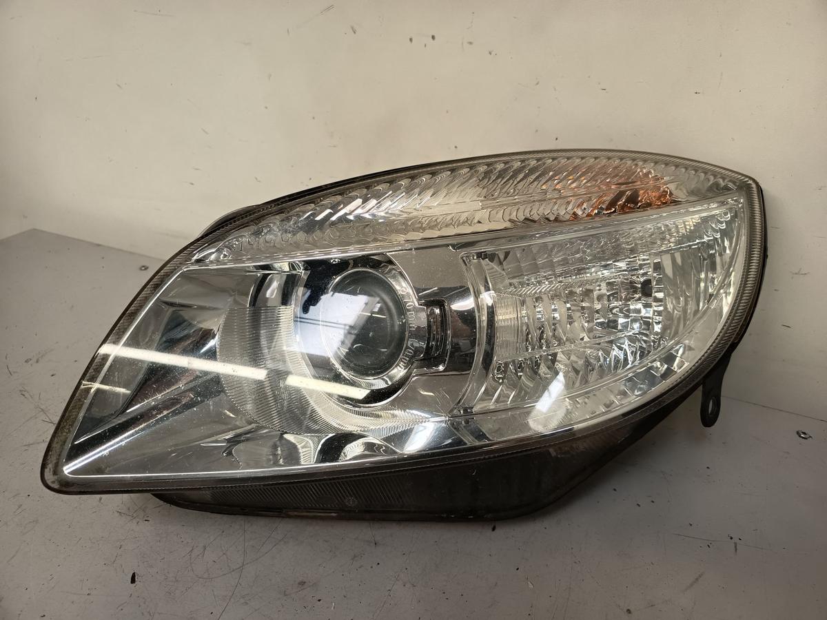 Skoda Fabia II Roomster 5J Hauptscheinwerfer links Halogen Linse Frontlicht