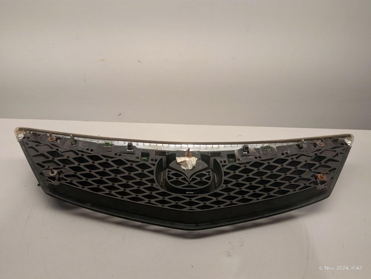 Mazda 2 DY orig Kühlergrill Grill Emblem Facelift ab Bj 2005