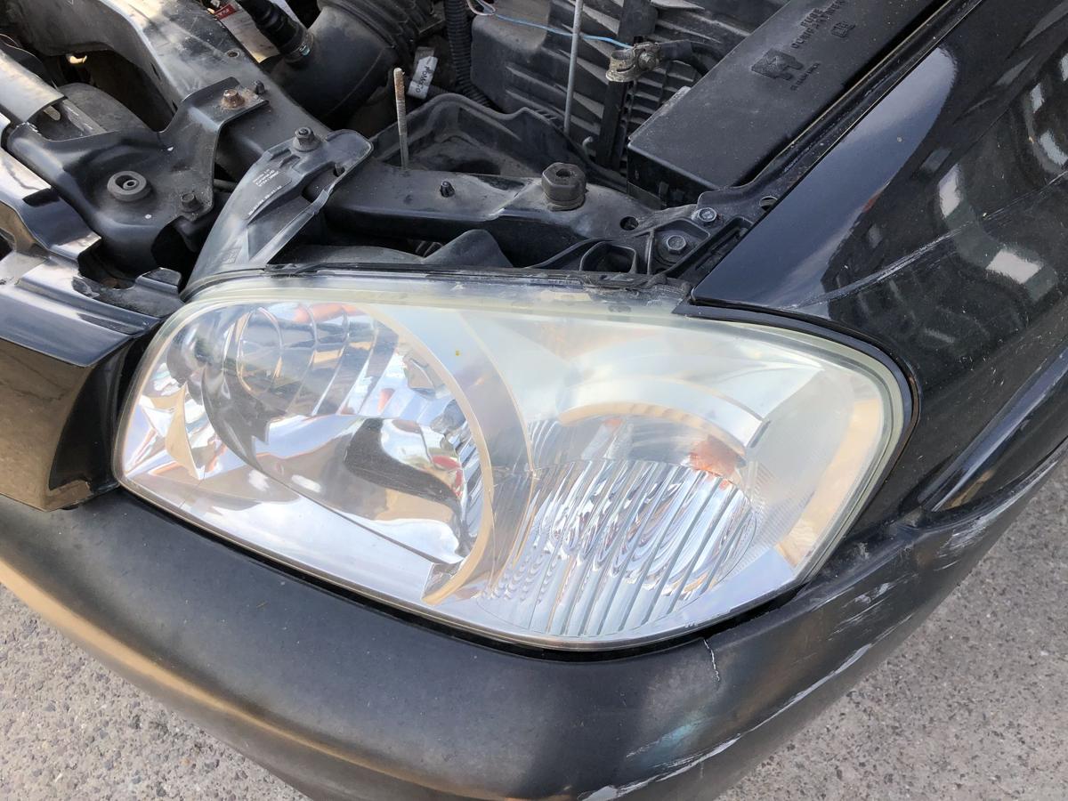 Mazda Tribute EP ab 2004 Scheinwerfer links Halogen Lampe EU Version Schaden!