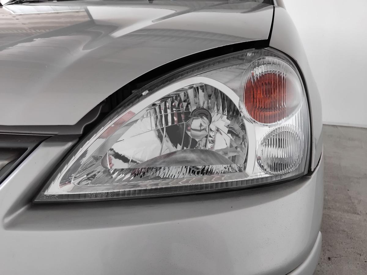 Suzuki Liana Scheinwerfer links Depo Halogen mit LWR BJ2004