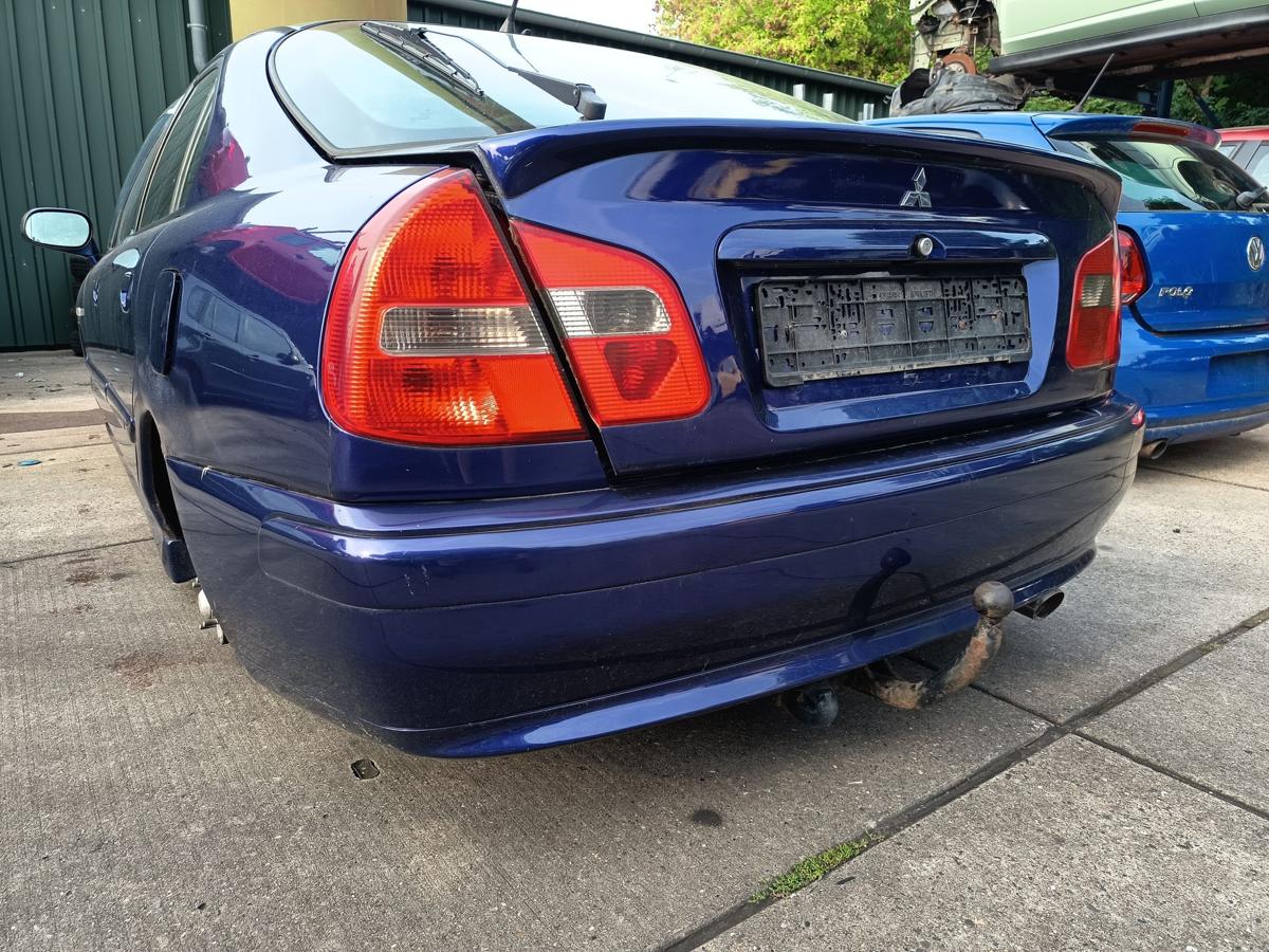 Mitsubishi Carisma original Stoßstange hinten Facelift ab 02 dunkelblau metallic