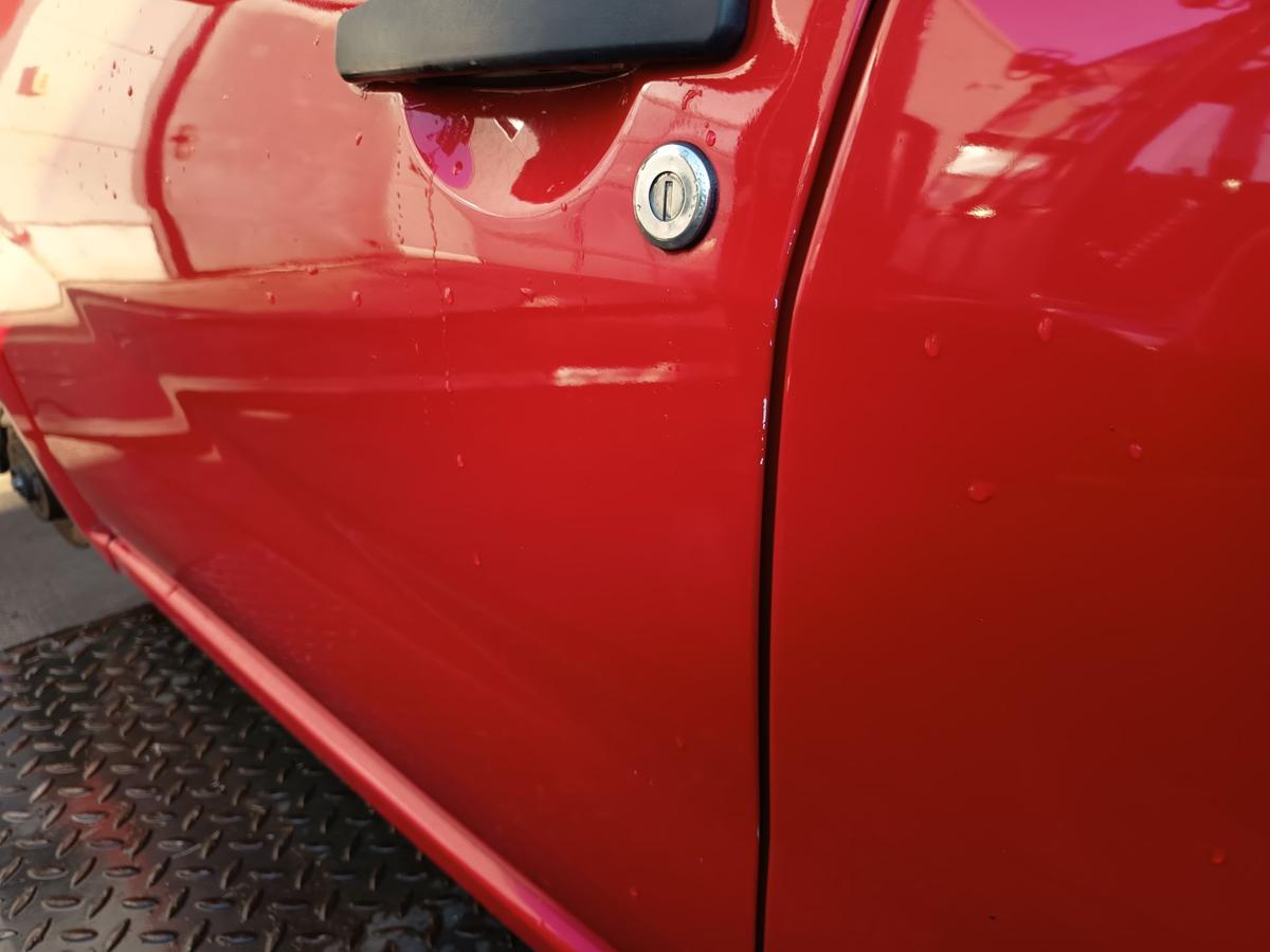 Dacia Sandero 1 BS original Tür vorn links Fahrer OV21D Red Passion Bj 2009