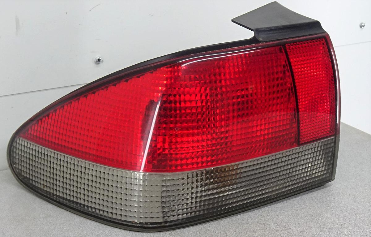 Saab 900 Rückleuchte Rücklicht außen links 4398517 Bj1997 Limousine 5 Türig