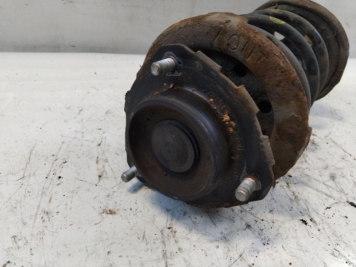 Toyota Avensis T22 orig Federbein Sto&szlig;d&auml;mpfer vorn links 1.8 95kw 1ZZ BJ2002