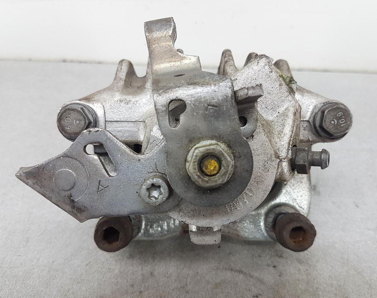 VW Golf IV Bremssattel hinten links Bj1998 1,6 74kw AKL inkl Träger Lucas