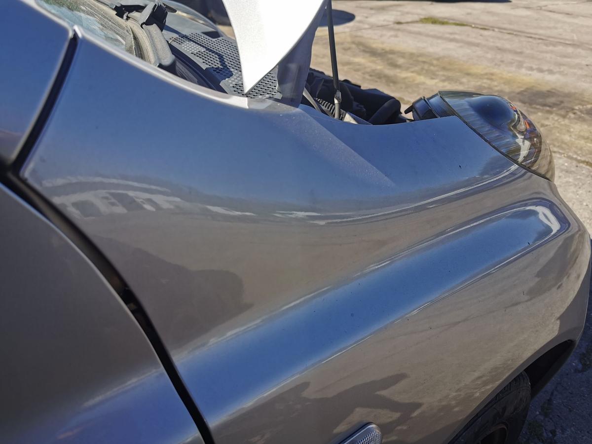 Nissan Micra K12 Kotflügel Fender Seitenwand vorn rechts KY0 Sporty Silver Met