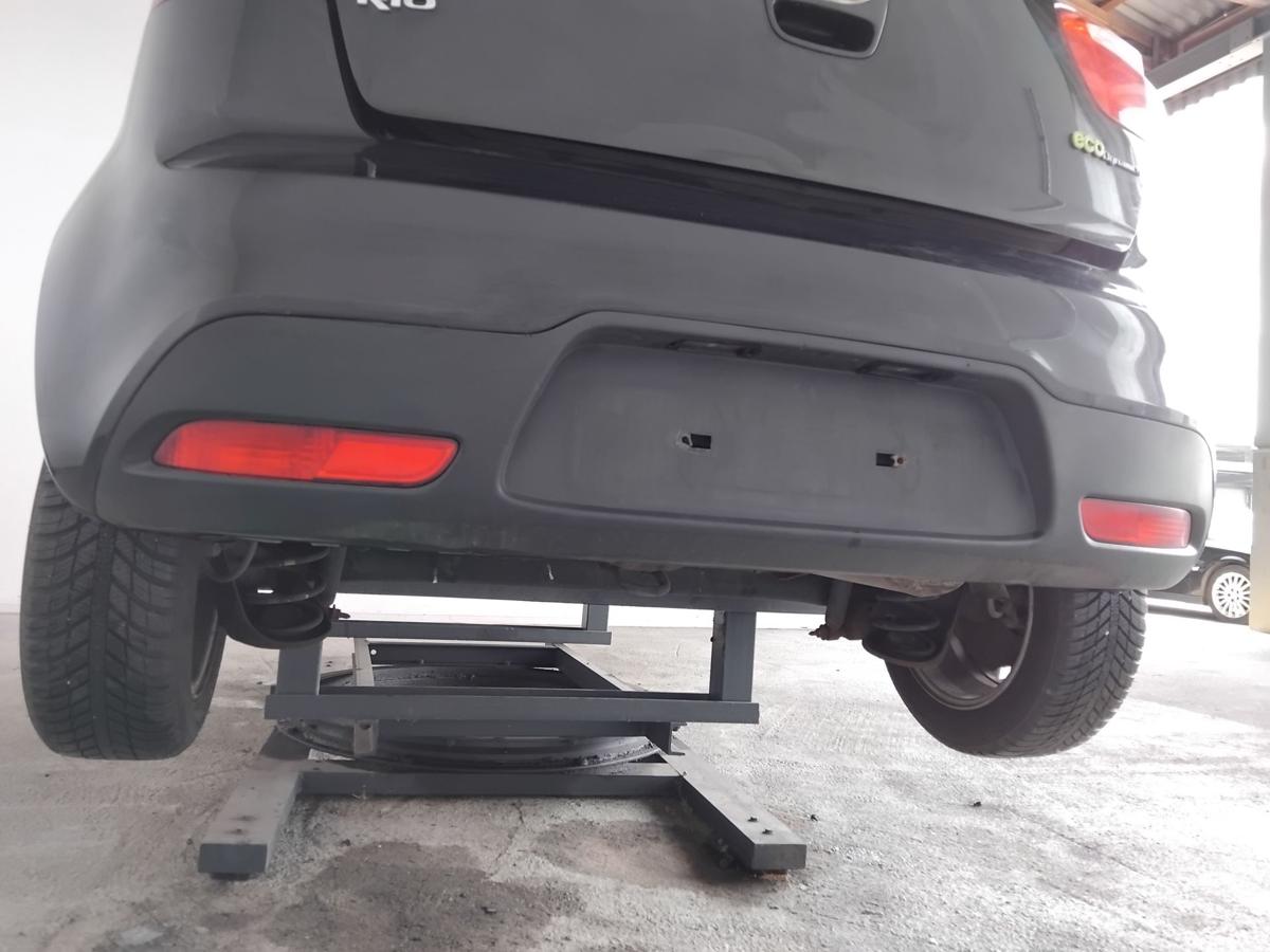 Kia Rio III UB original Sto&szlig;f&auml;nger Sto&szlig;stange hinten 3-t&uuml;rig BJ2012 AURORA BLACK