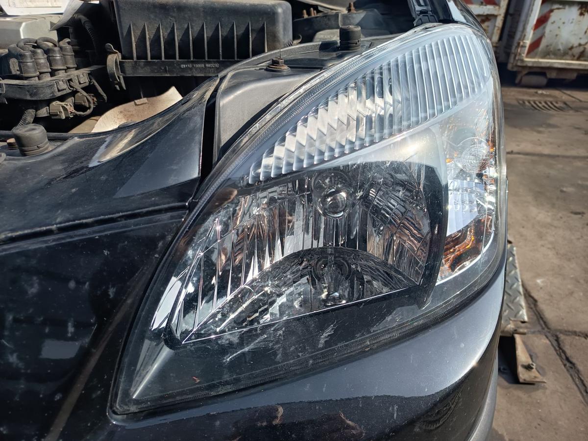 Kia Rio II original Scheinwerfer links Halogen Haupt Licht Front Bj 2009