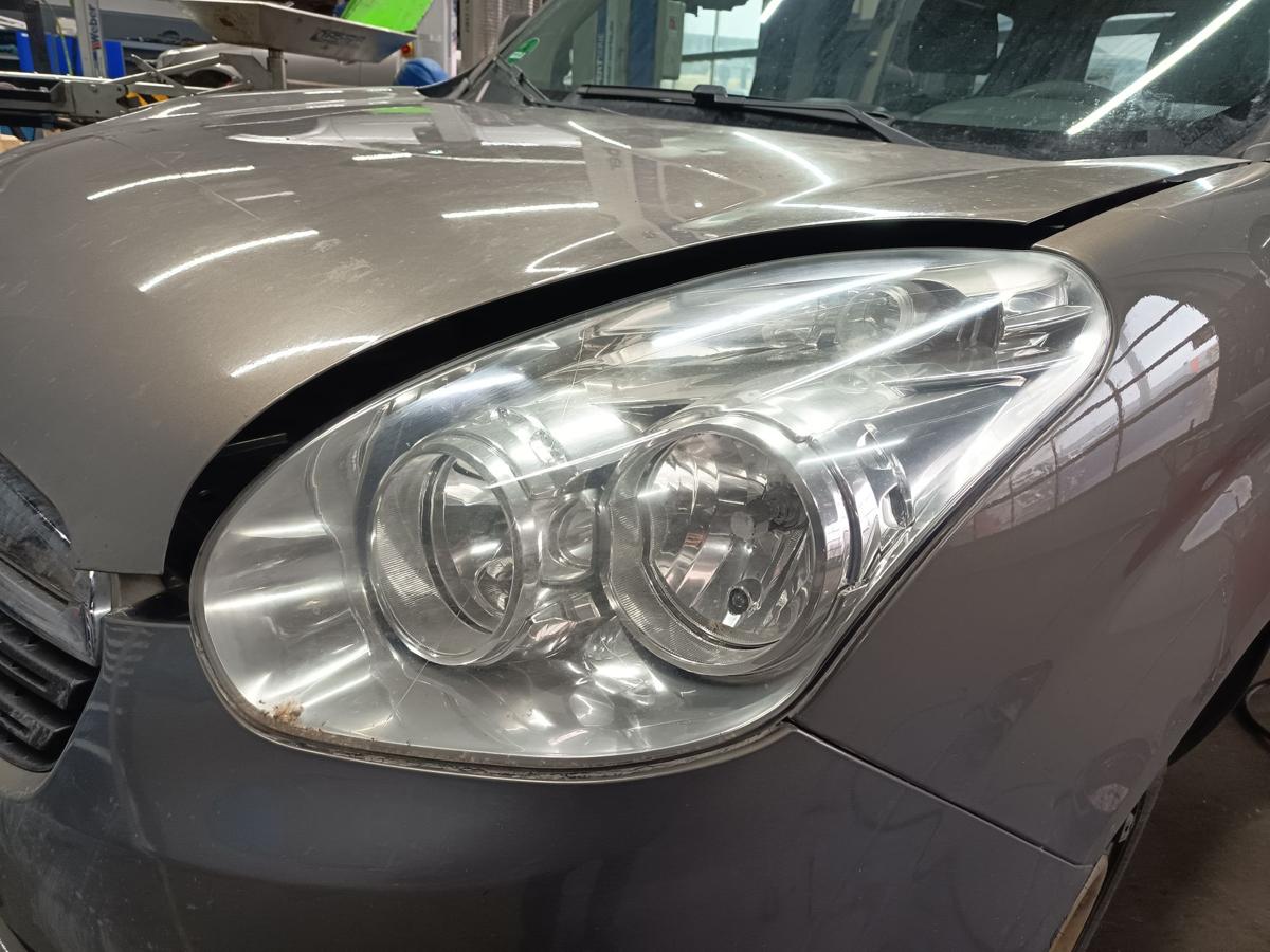 Opel Combo D original Scheinwerfer links Halogen Bj 2012