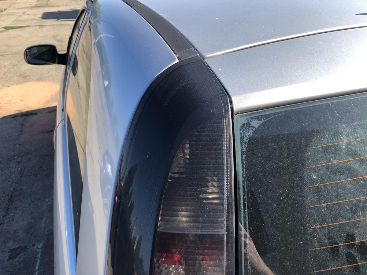 Opel Corsa C ab 2003 Rückleuchte links Rücklicht Heckleuchte dunkel getönt