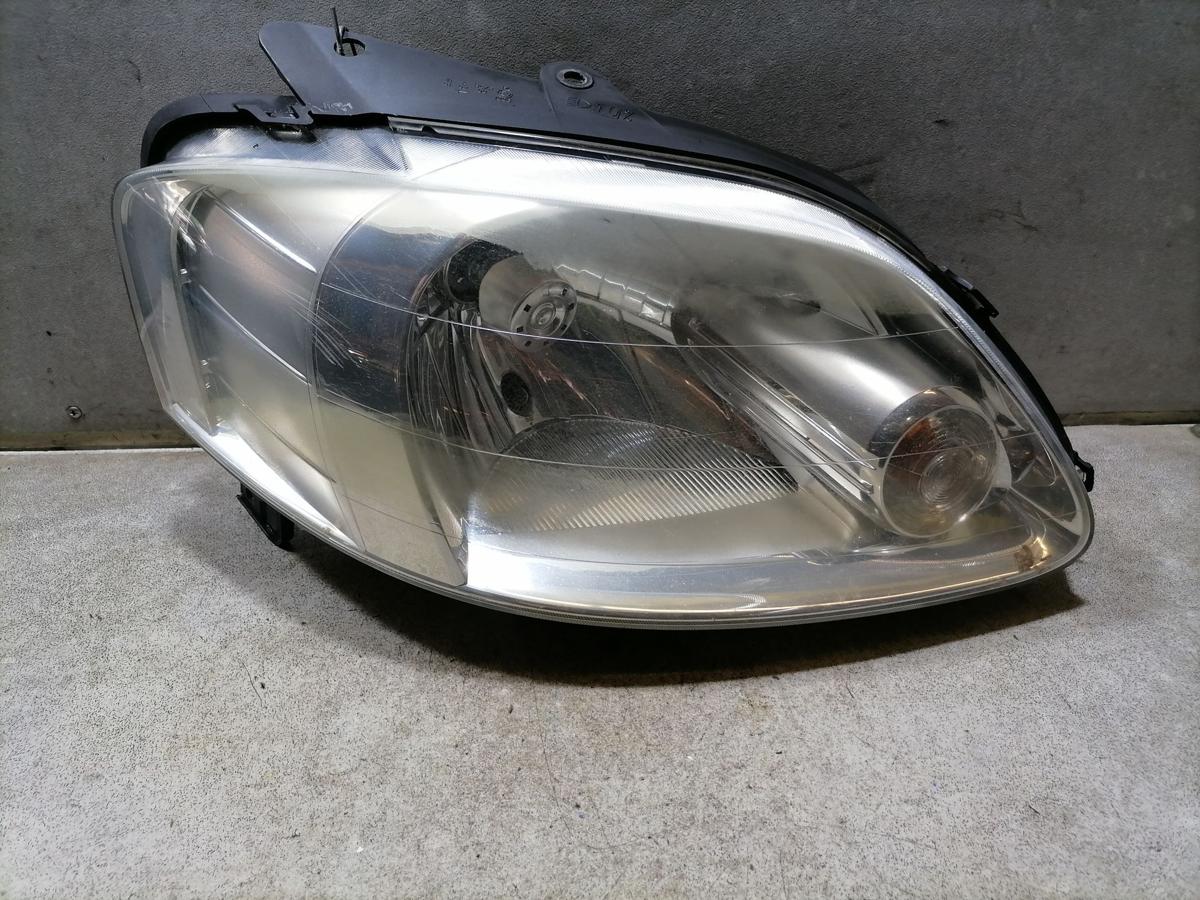 VW Fox original Scheinwerfer vorn rechts Halogen mit LWR leicht vergilbt Bj.2005