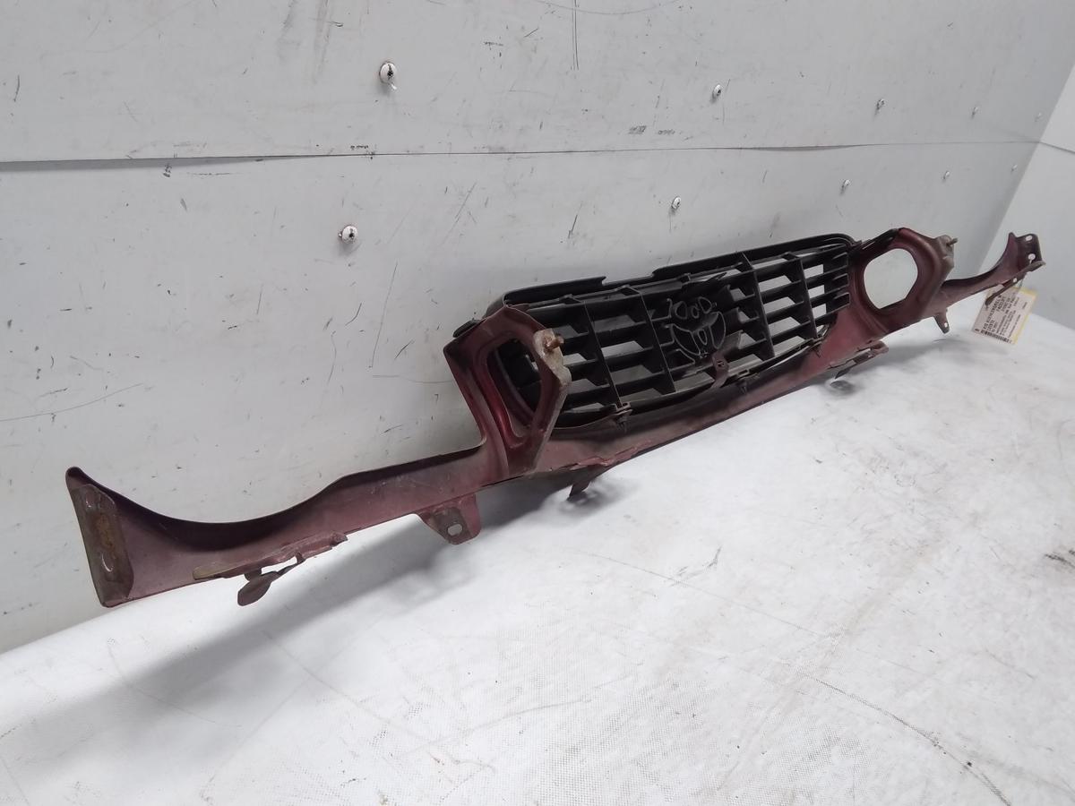 Toyota Corolla E11 Facelift original Kühlergrill mit Leiste unten BJ2001 3N8 Red Pearl