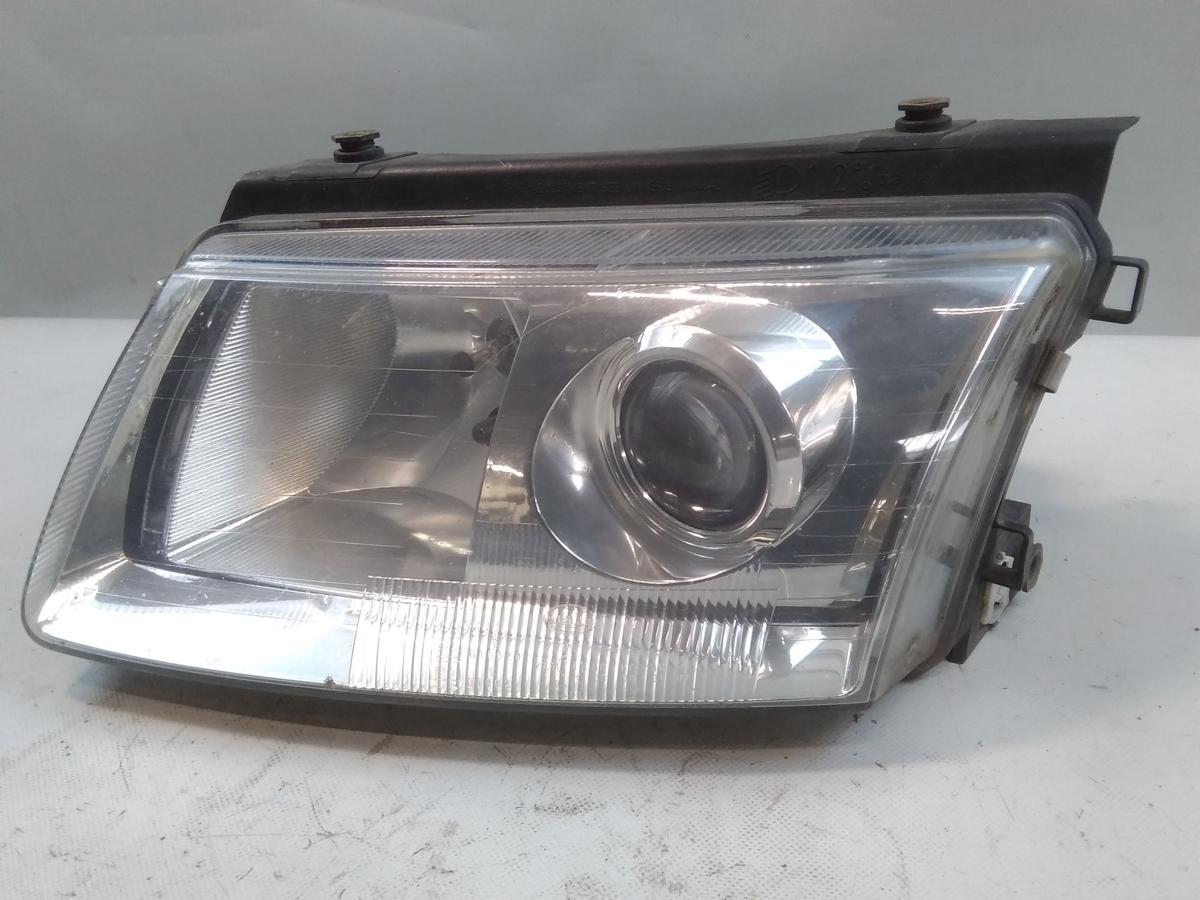 VW Passat 3B original Scheinwerfer links Xenon mit LWR HELLA BJ2000