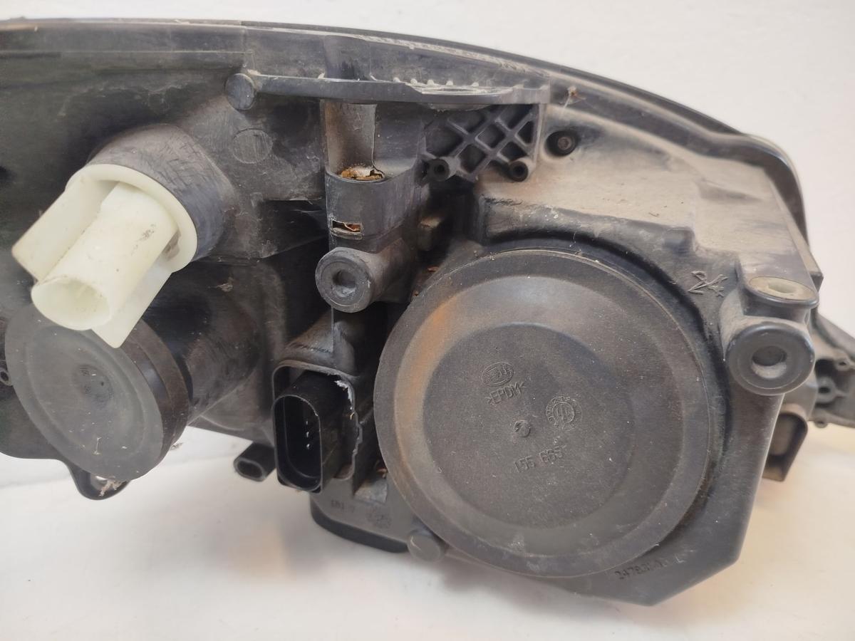 Skoda Roomster Fabia 2 Scheinwerfer links Halogen H4 Hella OE Hauptscheinwerfer