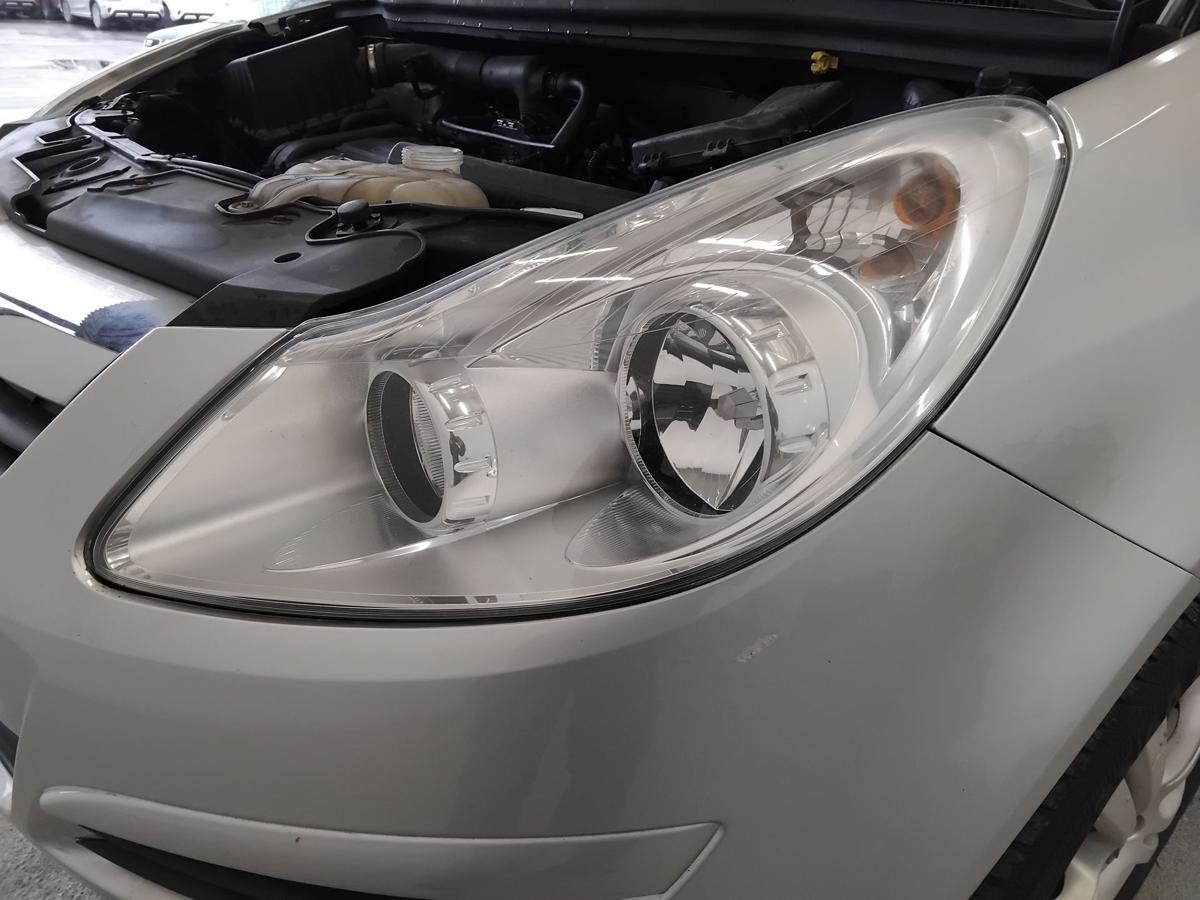 Opel Corsa D original Scheinwerfer links chrom Halogen mit LWR BJ2006