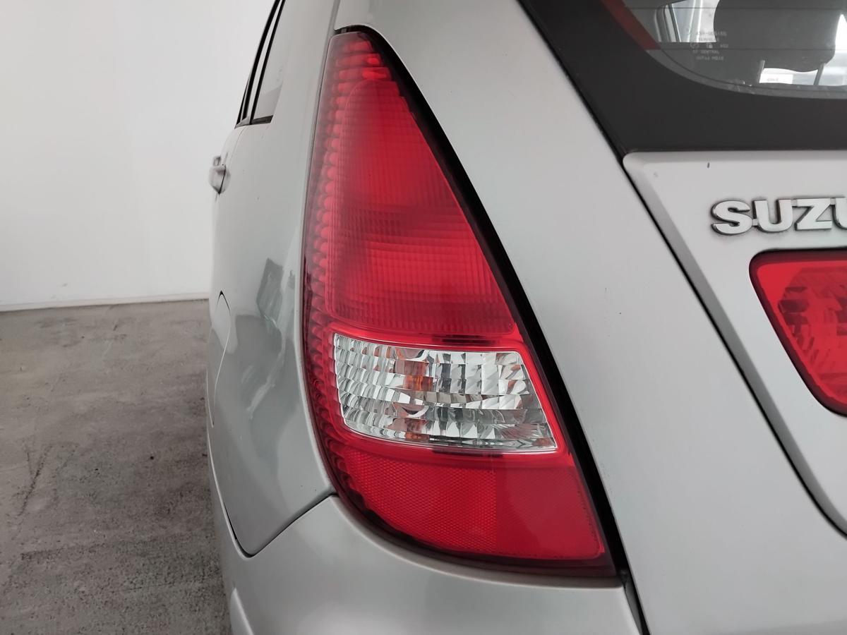 Suzuki Liana Kombi original R&uuml;ckleuchte Heckleuchte Schlussleuchte links BJ2004