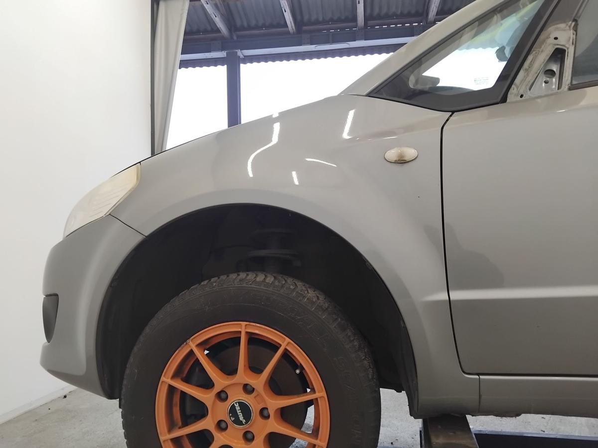 Suzuki SX4 original Kotfl&uuml;gel vorn links ohne Radlaufverkleidung BJ2006