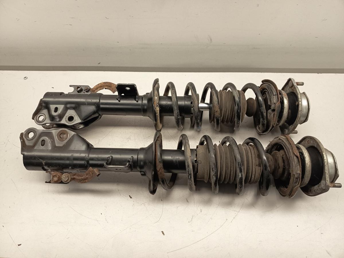 Daihatsu Cuore orig Federbeine vorne 1.0 51kW Baujahr 2009